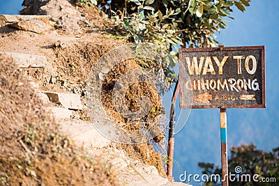 Guide post â€œway to Chhomrongâ€ on the way to Annapurna base c Stock Photo
